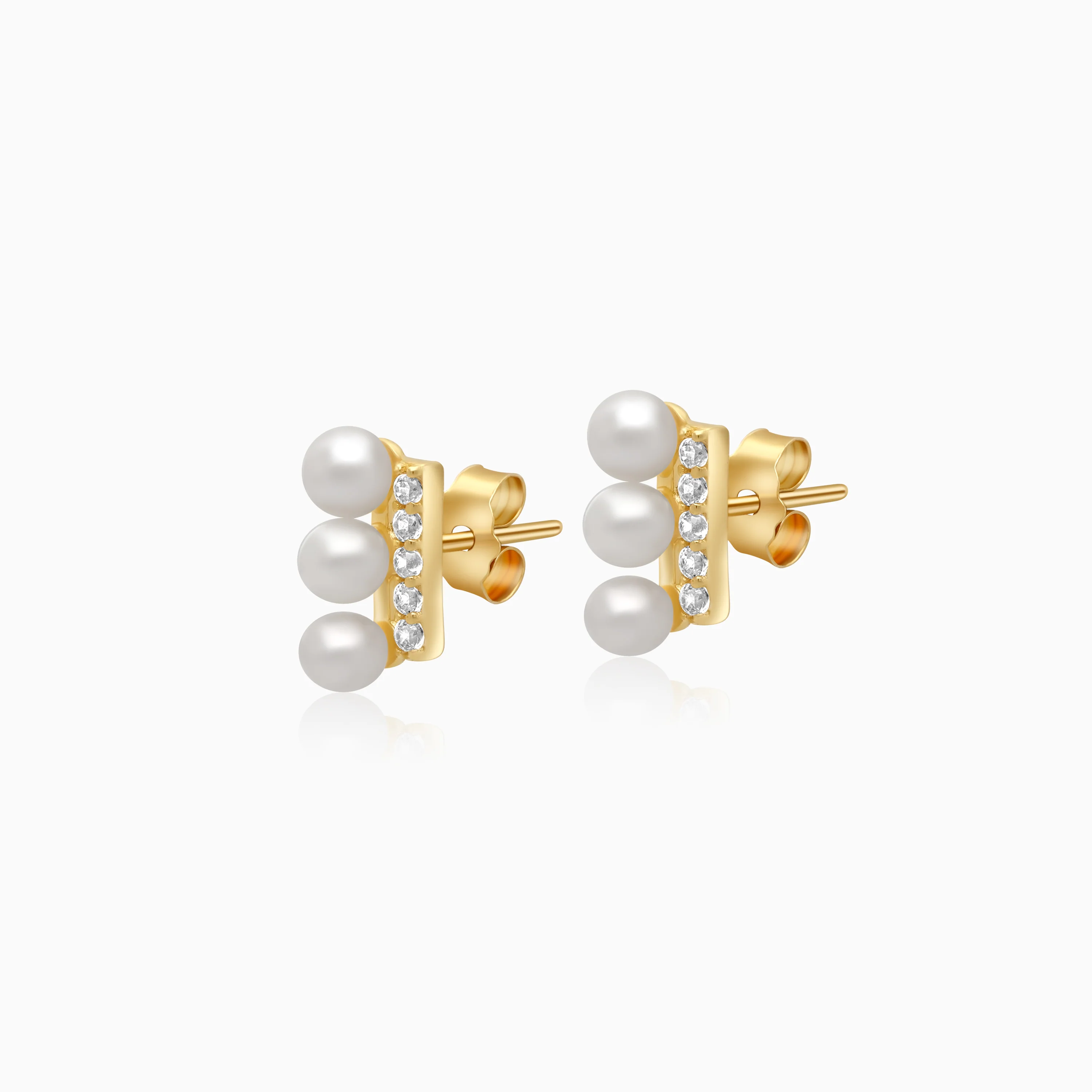 18k yellow gold earrings features 3 pearls aligning with zircon stones - Image 3