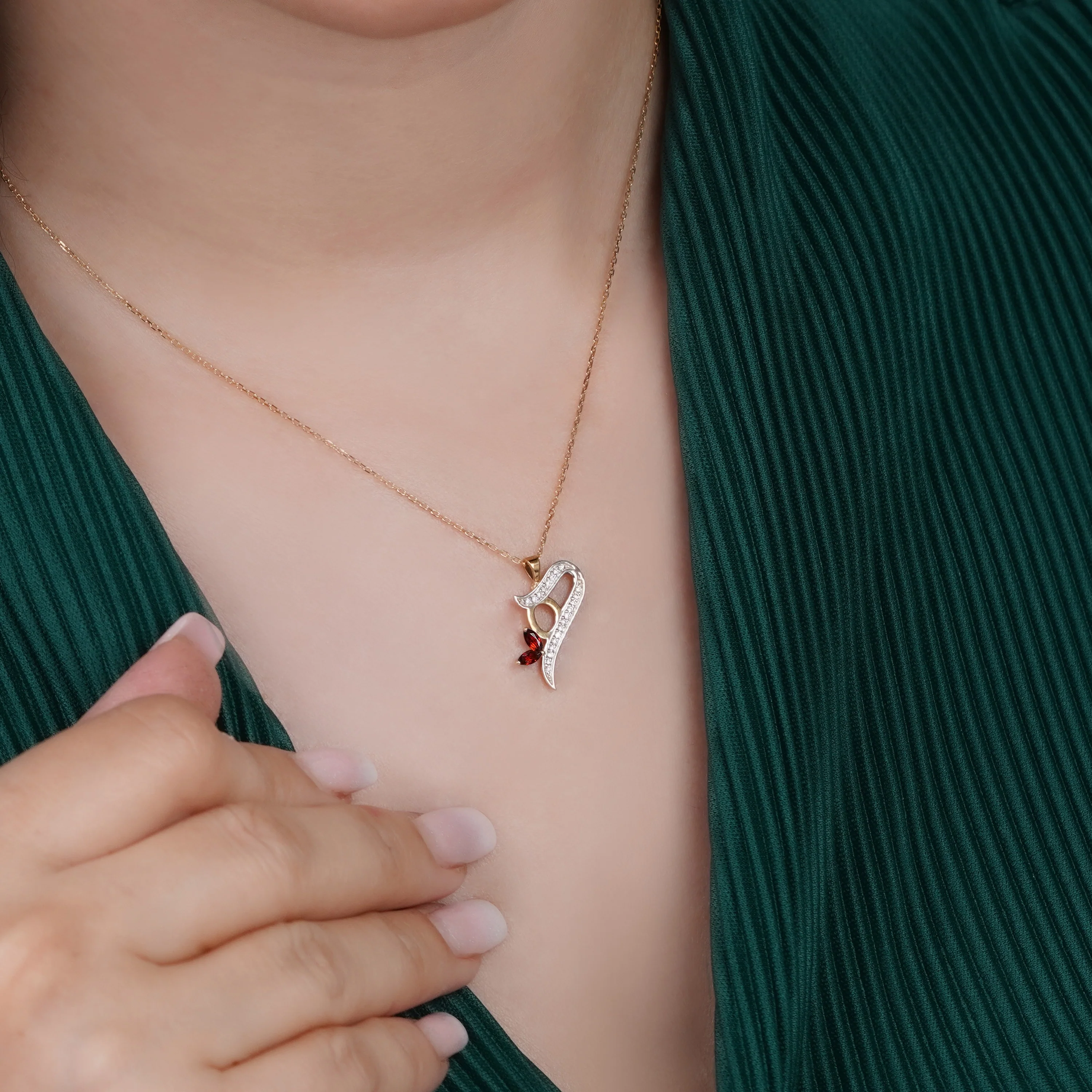 18k Yellow Gold ‘Haa’ Arabic Letter Necklace with Diamonds & Garnet | Horoufi Diamond Collection - Image 2