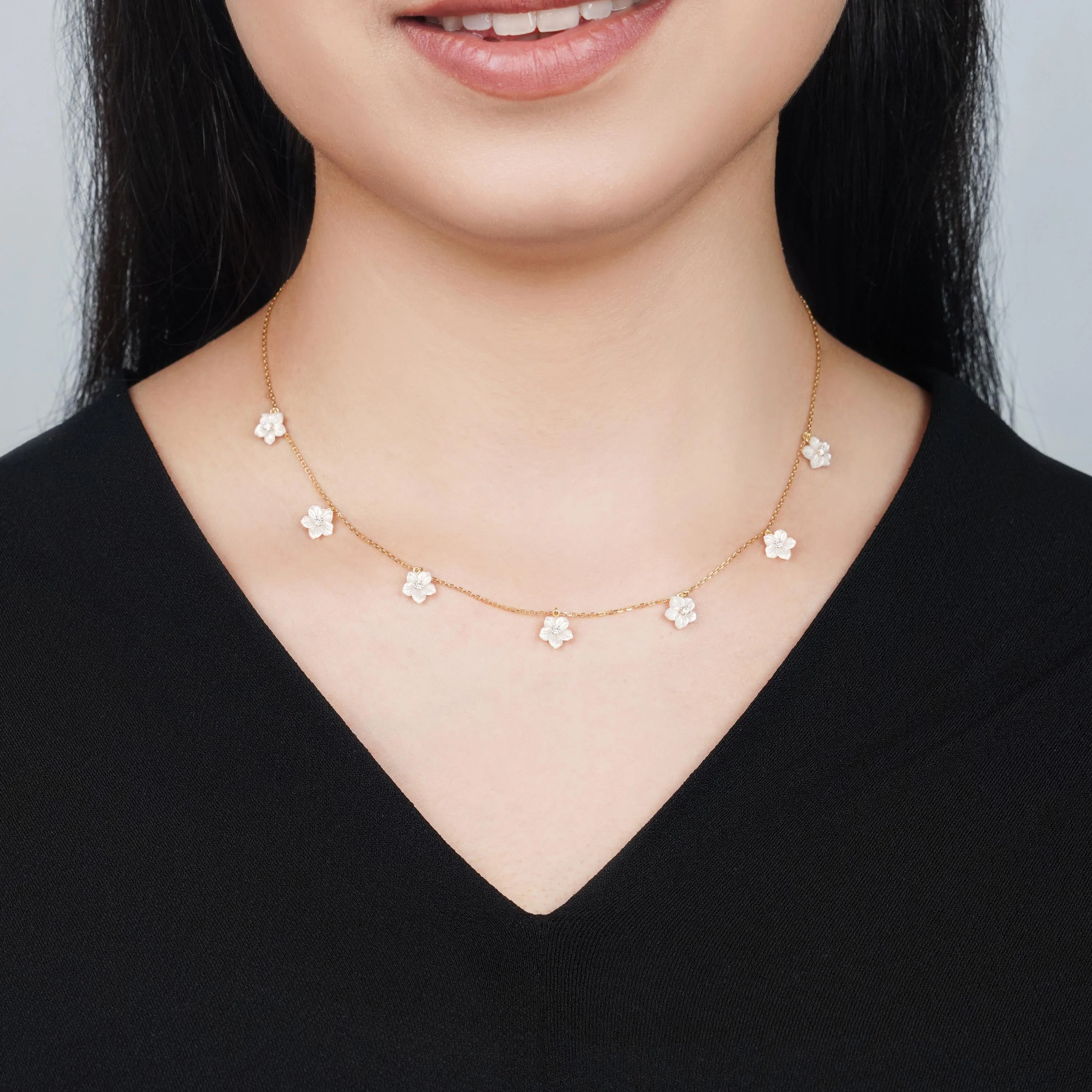 18K Yellow Gold Necklace Decorated with Mother of Pearl Flowers and Zircon Stones - Worood Collection - Image 2