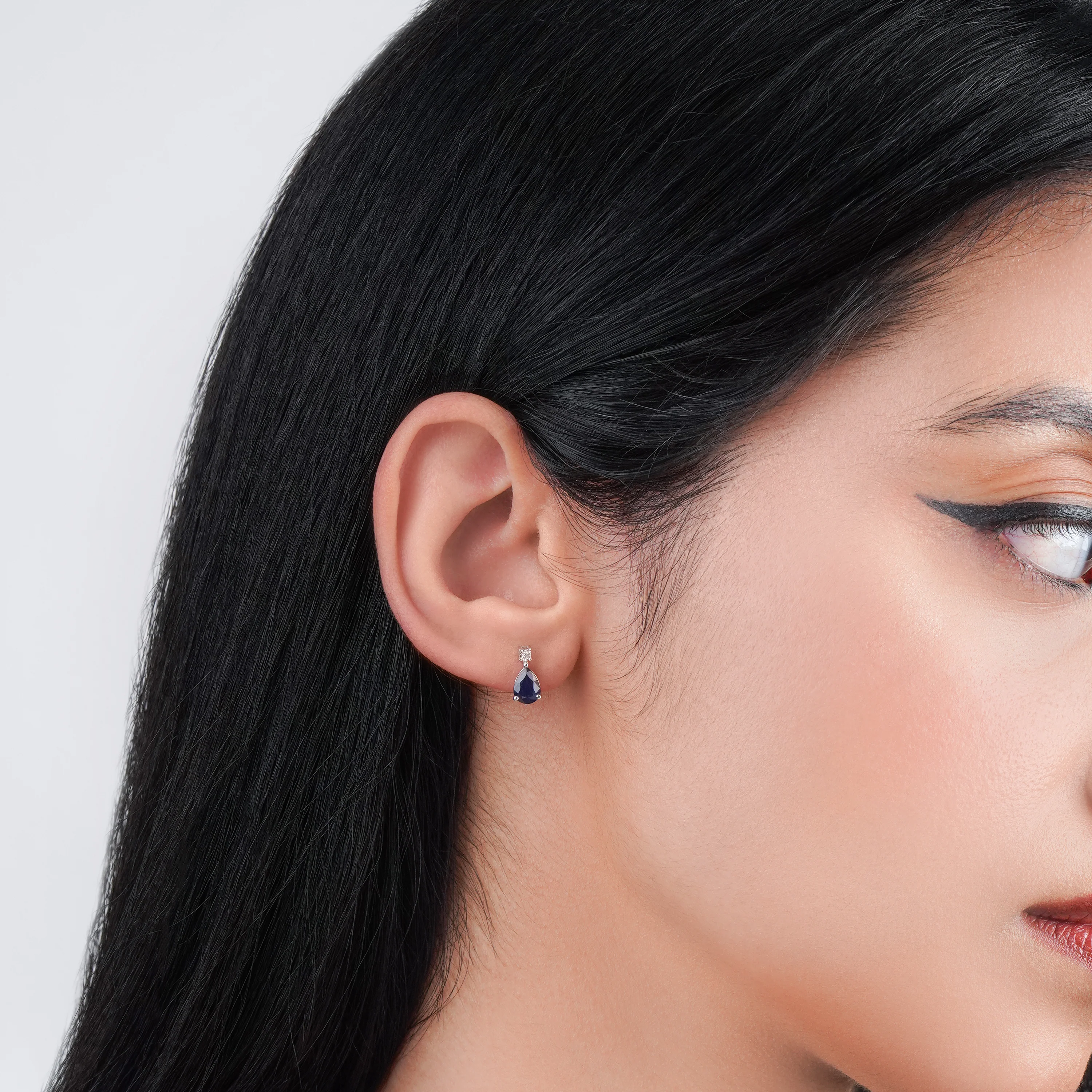Drop shape sapphire and round brilliant cut natural diamond earrings in 18k white gold | colour classic collection - Image 2